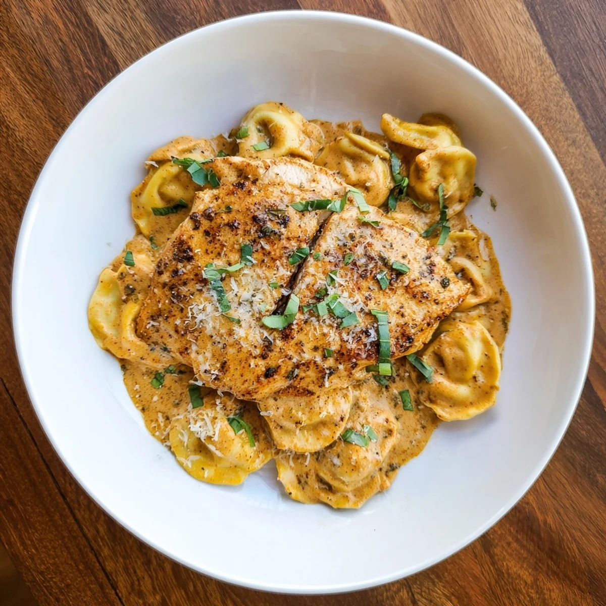Juicy chicken and cheese tortellini bathed in a sun-dried tomato cream sauce: the flavorful Marry Me dish.