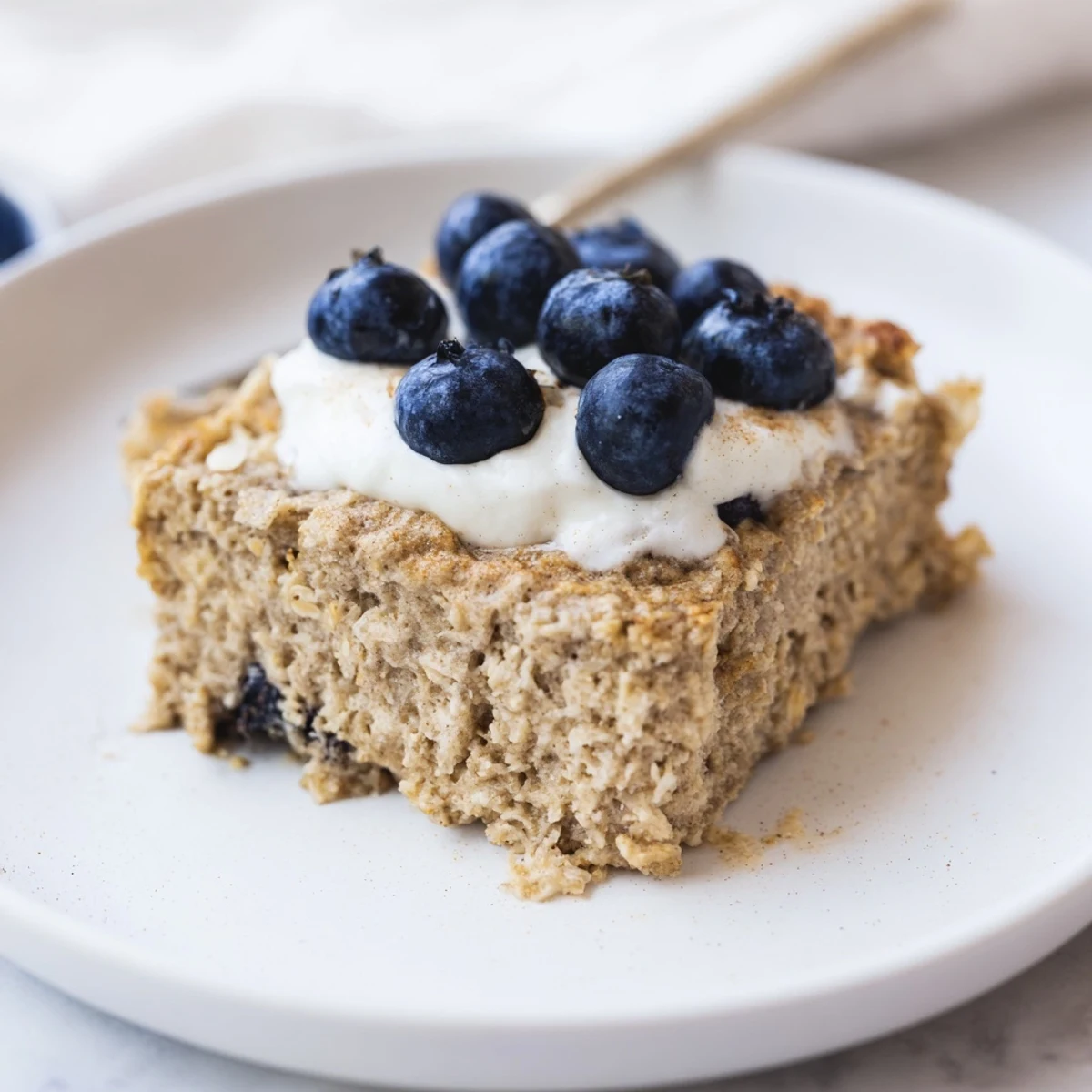Fluffy baked protein pancake oats, golden-brown and ready to eat, a perfect breakfast choice.