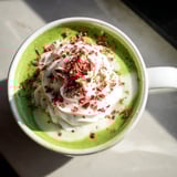 Enjoy a festive Cozy Peppermint Matcha Christmas Latte with its vibrant green matcha and holiday flavors.