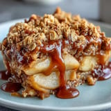 Golden baked Father's Day Whiskey Caramel Apple Crisp topped with oats, perfect with ice cream.