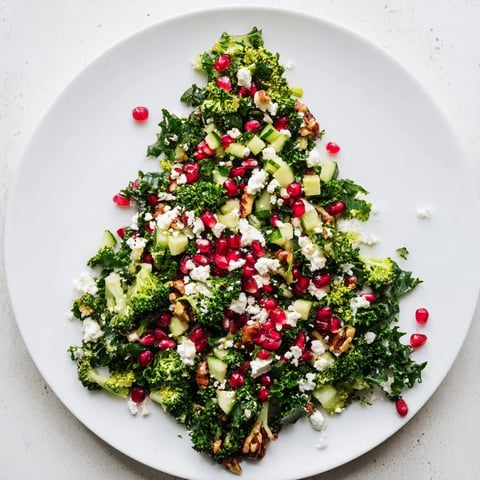 Festive Chopped Christmas Tree Salad, a vibrant vegetarian salad with feta and pomegranate.