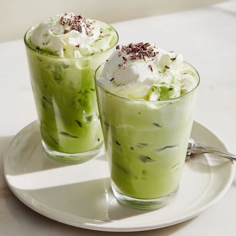 Creamy sugar-free white chocolate and matcha layered in a refreshing Sugar-Free Candy Cane Iced Matcha.