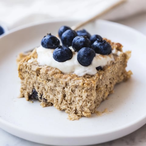 Fluffy baked protein pancake oats, golden-brown and ready to eat, a perfect breakfast choice.