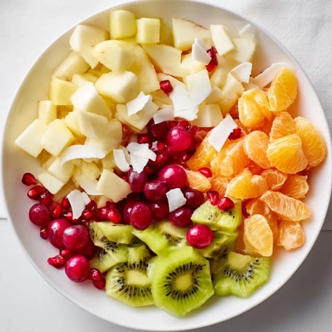A bright and beautiful Snowflake Fruit Medley, ready to be tossed with a sweet citrus dressing.