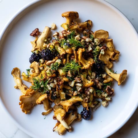 A vibrant close-up of the Northwest Forest Forager: earthy mushrooms, fresh berries, and toasted nuts.