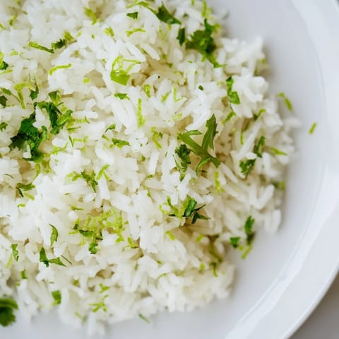 Aromatic Cilantro Lime Rice, bright with zesty lime, served warm and fluffy.