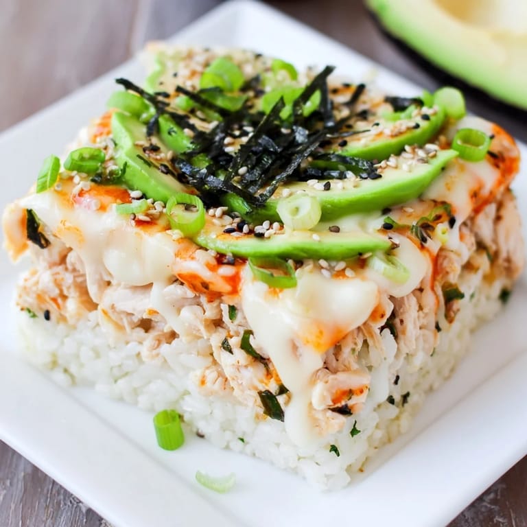 Cheesy Chicken Sushi Bake, a savory, deconstructed sushi dish perfect for sharing with friends.