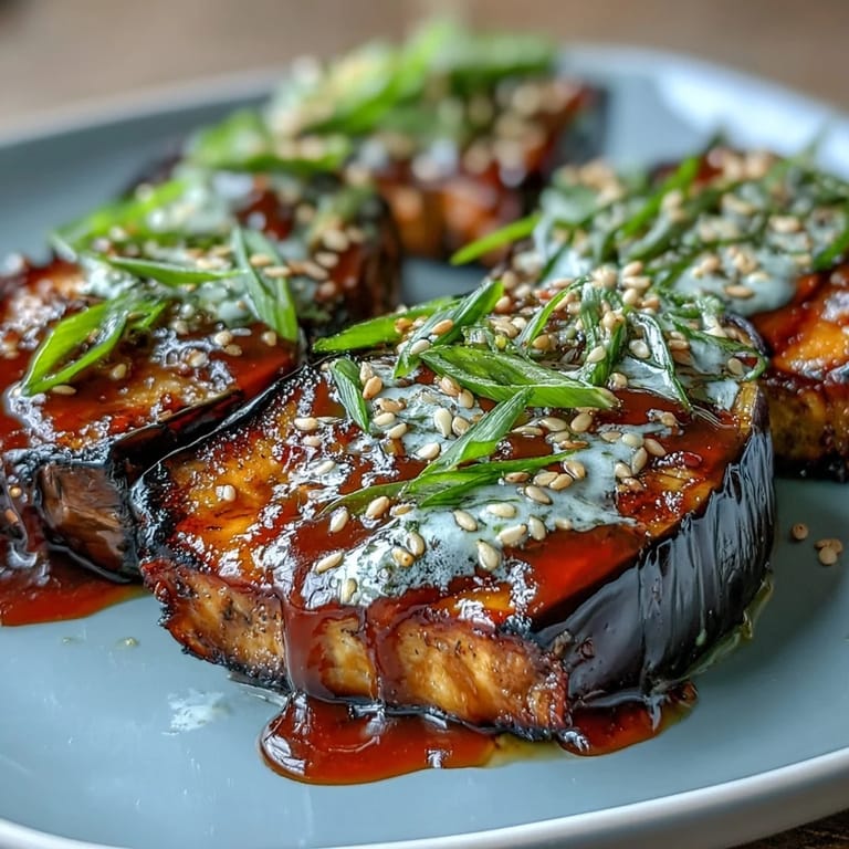 Umami-rich Japanese miso-glazed eggplant, tender and caramelized, perfect as a vegetarian main or side.